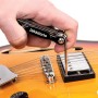 Outil multifonction pour guitare / basse D'Addario